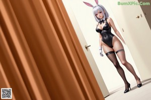 A woman in a bunny costume standing in the desert.
